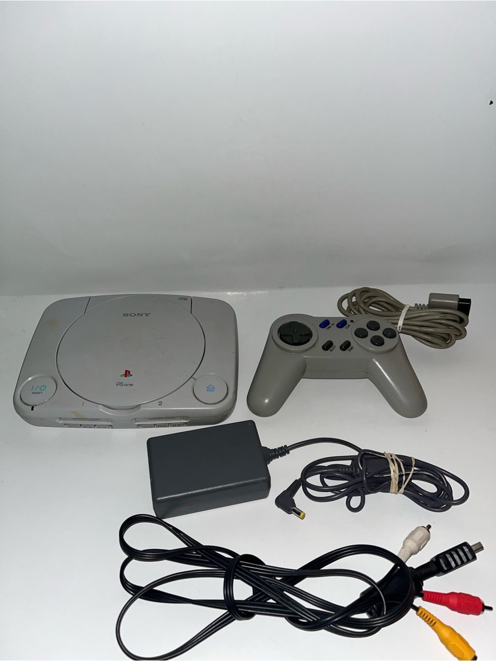 Sony PSone Console with Gray Controller and Cables